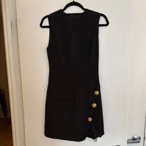 Elegant Black Sleeveless Split Mini Dress with Gold Accents